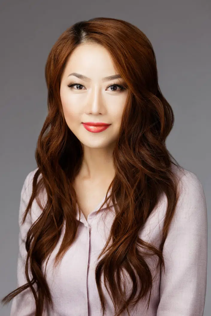 Ginger Hair Asian Woman Posing for Headshot